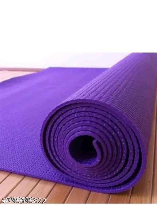 Purple yoga mat with strap